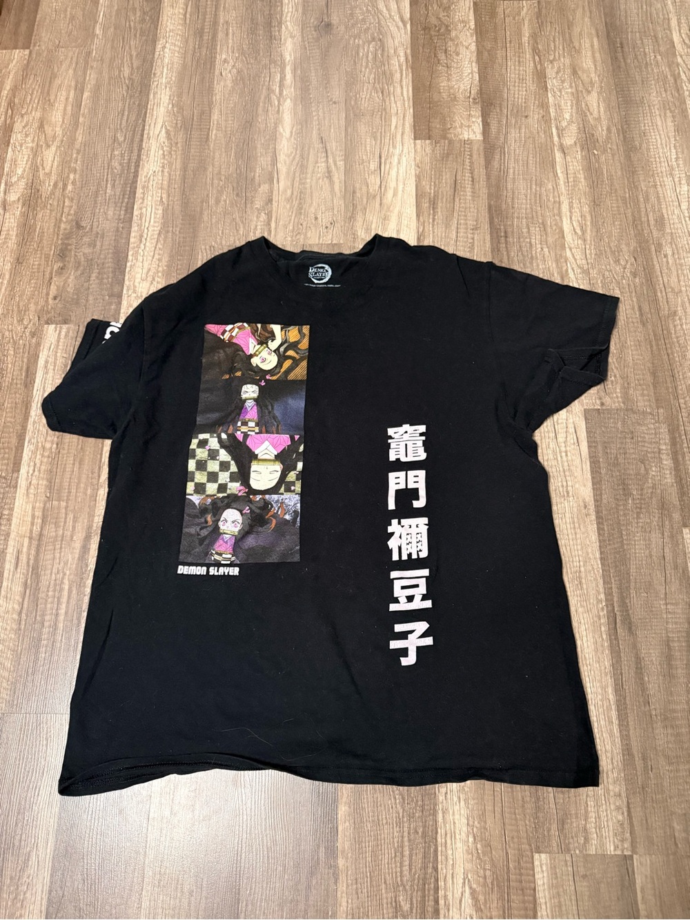Graphic Image Black Demon Slayer Panel Tee with Pink and Purple Accents